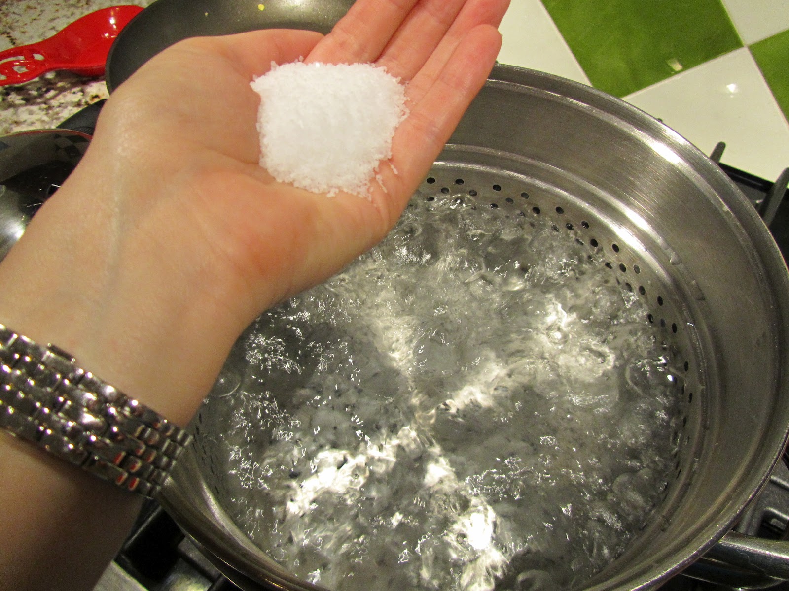Adding salt to boiling water